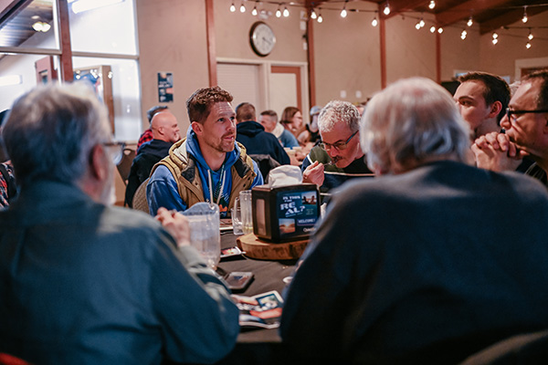 Men Enjoying Conversation at Retreat