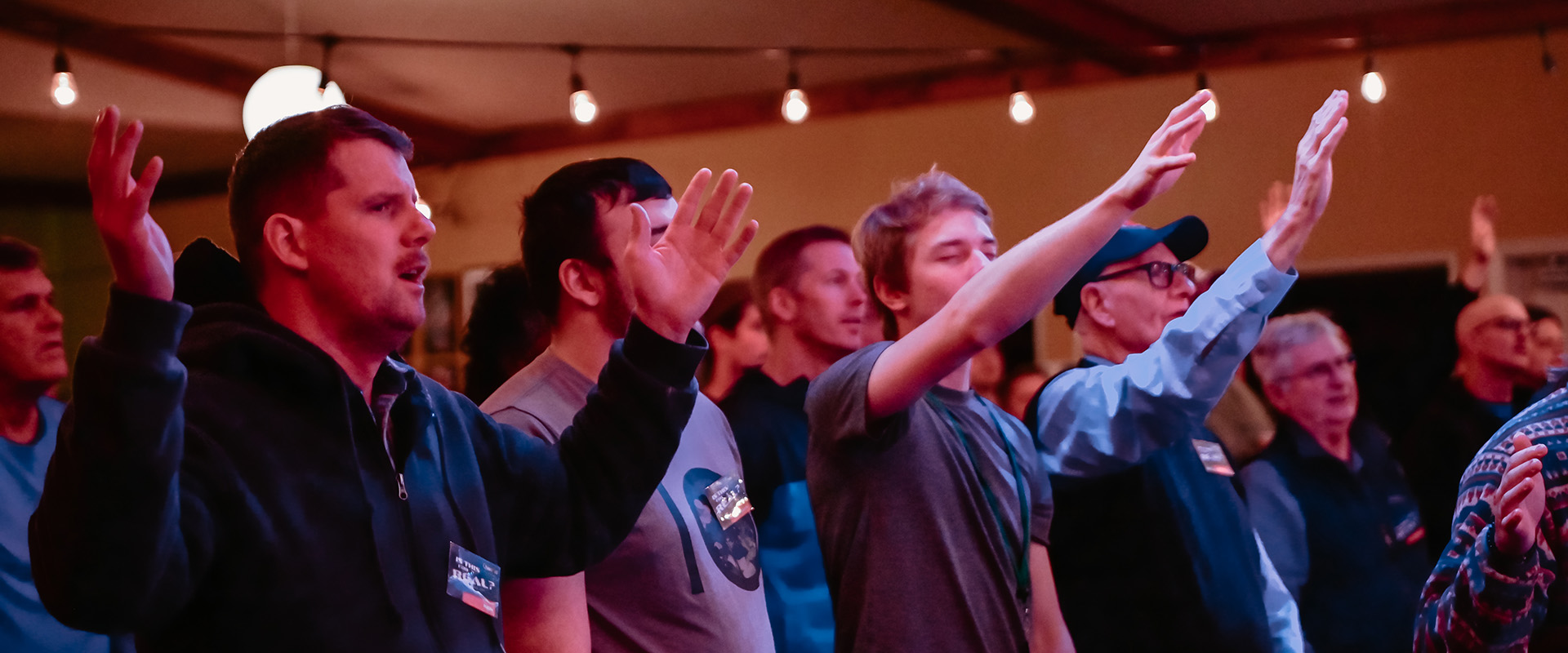 Men Enjoying Worship at Retreat