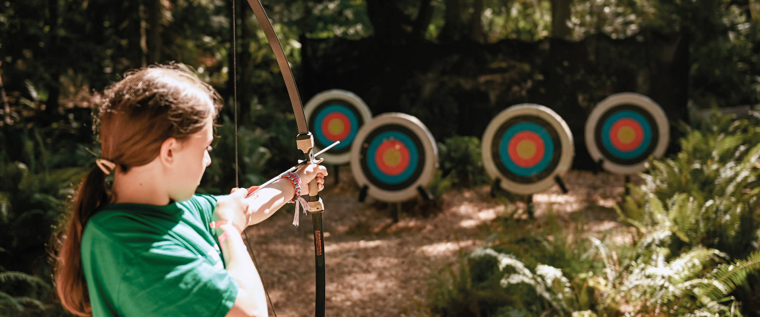 Playing Archery At Qwanoes