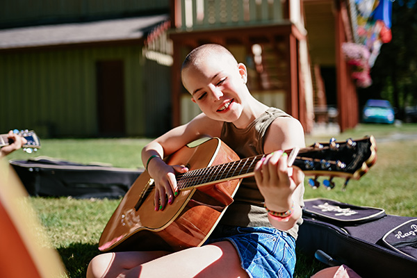 Practicing Guitar at Qwanoes