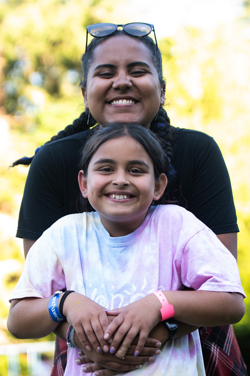 Staff Member with Camper at Qwanoes